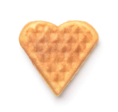 Front view of homemade heart shaped waffle isolated on whiteの写真素材