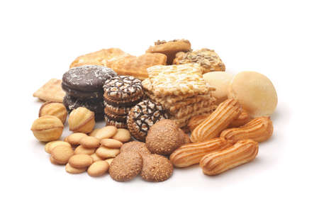 Pile of  of various fresh baked pastry isolated on white