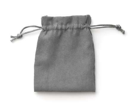 Top view of empty gray fabric drawstring gift bag isolated on whiteの写真素材