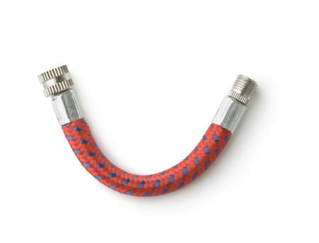 Top view of bicycle air pump extension hose isolated on white