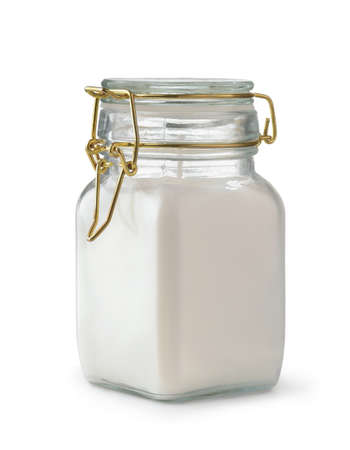 White cented wire jar candle isolated on whiteの写真素材