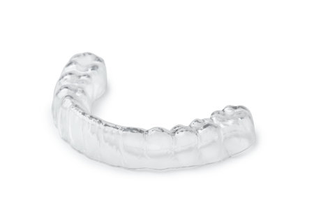 Clear silicone dental mouthguard isolated on white