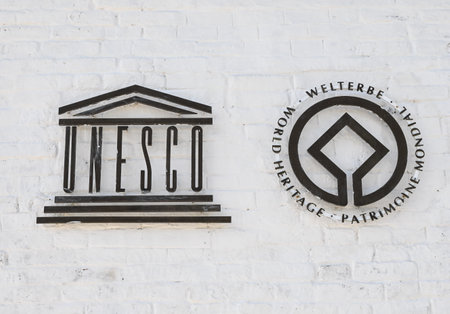Sviyazhsk, Russia, May, 2022. Unesco sign on old white brick wallのeditorial素材