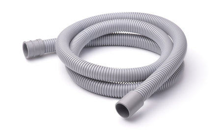 Gray plastic corrugated hose isolated on whiteの写真素材