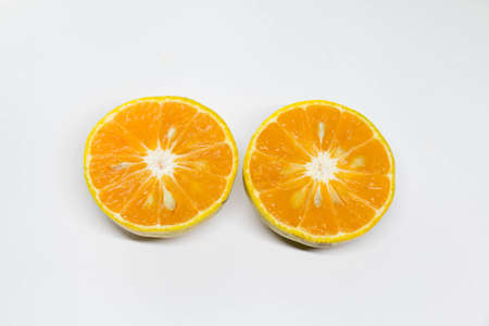 half orange on background with seedの写真素材