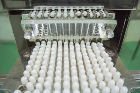 capsule filling machine in pharma or supplement  industryの写真素材