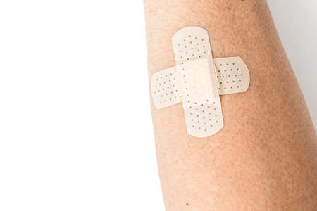 plaster on the Arm isolate backgroundの写真素材