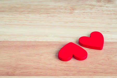 Two heart on a wooden background,Valentine's Dayの写真素材