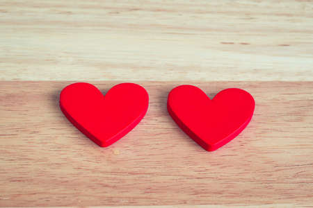Two heart on a wooden background,Valentine's Dayの写真素材