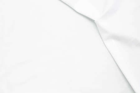 White cloth with soft waves abstract background.の写真素材