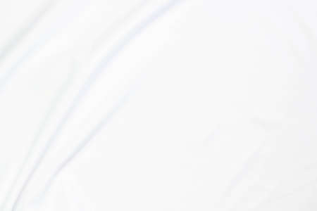 White cloth with soft waves abstract background.の写真素材