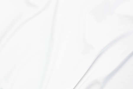 White cloth with soft waves abstract background.の写真素材