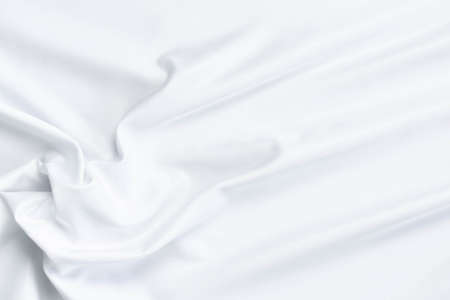 White fabric texture that is white cloth surface background with beautiful soft blur pattern.の写真素材