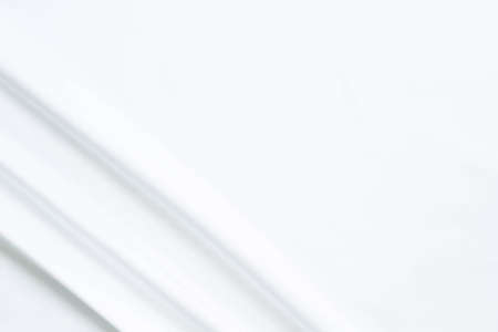 White fabric texture that is white cloth surface background with beautiful soft blur pattern.の写真素材