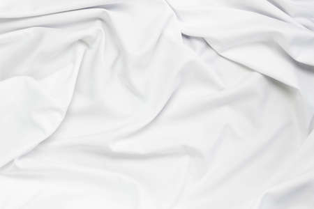White fabric texture that is white cloth surface background with beautiful soft blur pattern.の写真素材