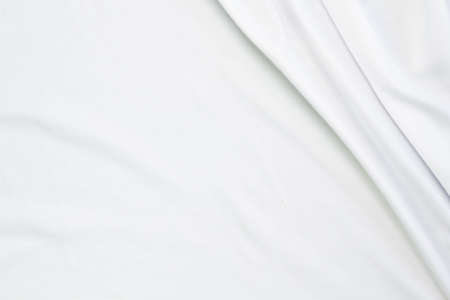 White fabric texture that is white cloth surface background with beautiful soft blur pattern.の写真素材