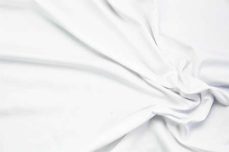 White fabric texture that is white cloth surface background with beautiful soft blur pattern.の写真素材