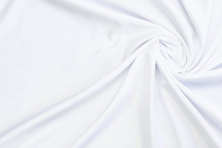 White fabric texture that is white cloth surface background with beautiful soft blur pattern.の写真素材