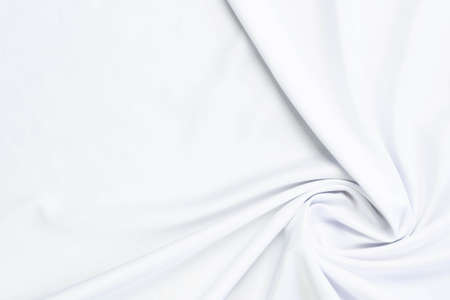 White fabric texture that is white cloth surface background with beautiful soft blur pattern.の写真素材