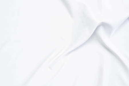 White fabric texture that is white cloth surface background with beautiful soft blur pattern.の写真素材