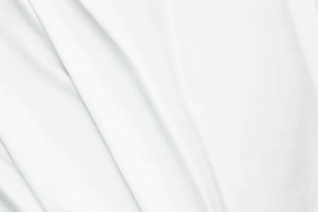 White fabric texture that is white cloth surface background with beautiful soft blur pattern.の写真素材