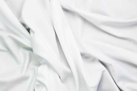 White fabric texture that is white cloth surface background with beautiful soft blur pattern.の写真素材