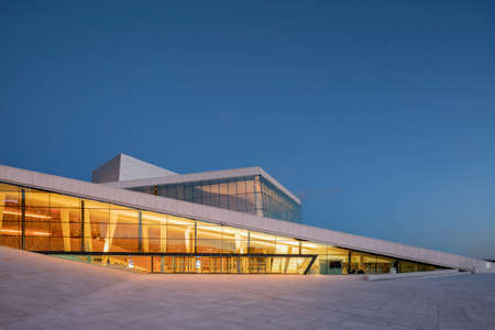 OSLO, NORWAY - APRIL 22 2016: Oslo Opera House in Oslo, Norway. It is the home of The Norwegian National Opera and Ballet, and the national opera theatre in Norway. The building is situated in the BjÃ¸rvika neighborhood of central Oslo, at the head of theのeditorial素材