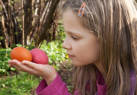 Girl with Easter eggs