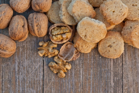 walnuts and bicuits on a woden table nuts walnutsの写真素材