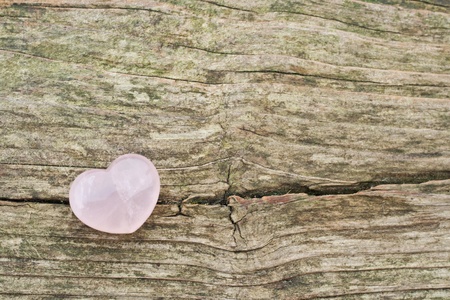 heart on wooden ground