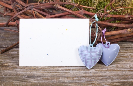 twigs, hearts and white cardの写真素材