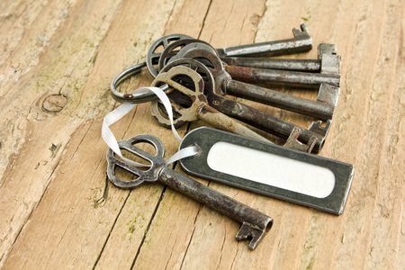 bunch of keys and label on  boardの写真素材