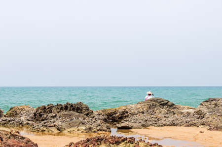 lonely beach with rockの写真素材