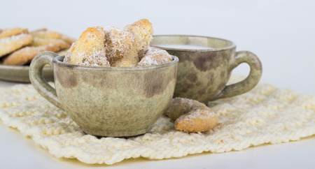 vanilla crescents and cup of milkの写真素材