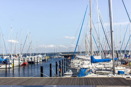 A port on the sea with many Sailing Boats