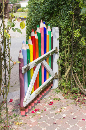 Creative garden door with crayonsの写真素材