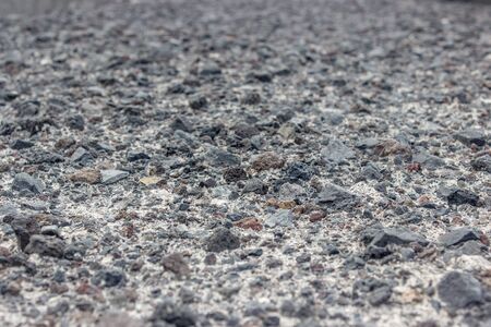 Pathscovering with black stones /の写真素材