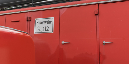 Detail of a fire truck with german text: Fire Department 112