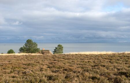 Landscape on the North Sea on the island of Sylt with rain cloudsの写真素材