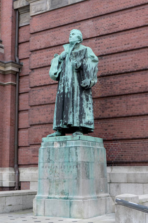 Bronze sculpture of Martin Luther in front of the Church of St. Michael in Hamburg, Germanyの写真素材