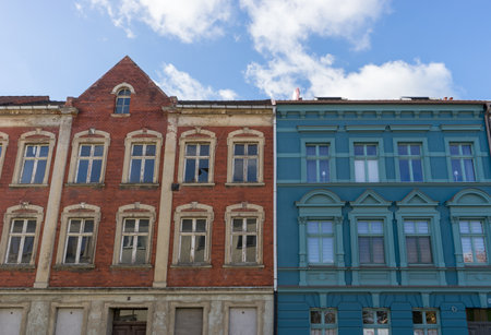Detailed view of an old and a renovated house facadeの写真素材