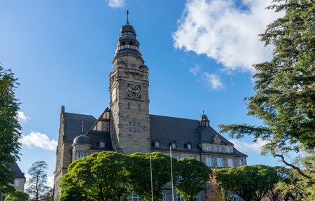 Town hall in Wittenberge, Barndenburg, Germany with blue sky and white cloudsの写真素材