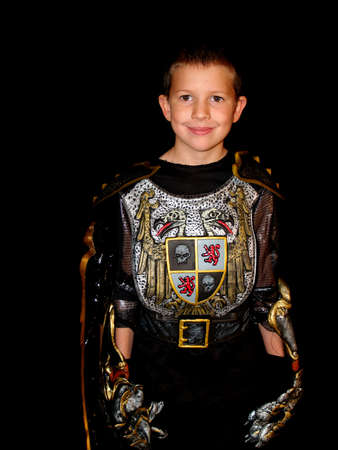 Child in his  costume with a grin on his face.の写真素材