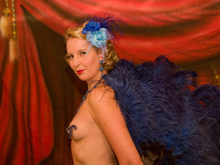 Burlesque performer shot in a studio setting.