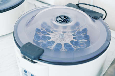 Medical biotechnology microbiology laboratory tools centrifuge backgroundの写真素材