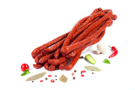 Boiled grilled smoked baked sausages with spices peppers laurel composition