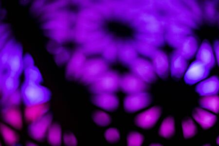 Patterns of purple bokeh lights at nightの写真素材