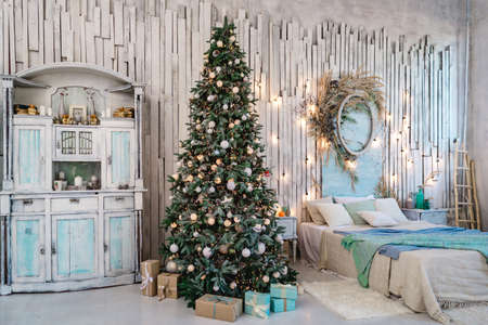 Merry Christmas and Happy Holidays. A beautiful living room decorated for Christmas.の写真素材