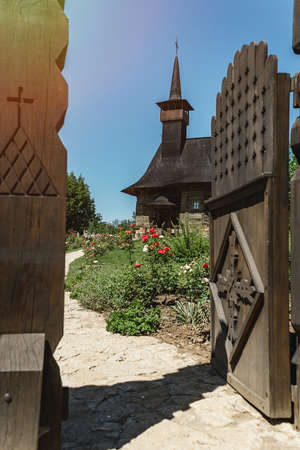 beautiful old wooden church in Moldovaの写真素材