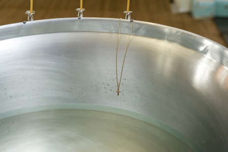 Childrens golden cross before baptism close upの写真素材
